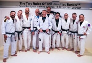 Paul Kindzia getting his black belt in his home dojo from a consortium of black belt instructors